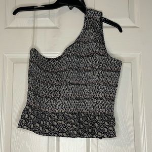 One-shoulder crop top with ruffle bottom